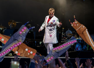 Elton John Pelted With Bedazzled Carhartt Overalls as Tacoma Fans Cheer for Encore