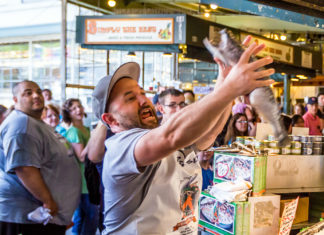 Pike Place Market Workers Begin Throwing Impossible Salmon
