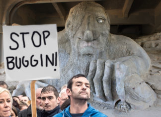 Fremont Troll Urged to Clutch More Fuel-Efficient Vehicle in Menacing Grasp