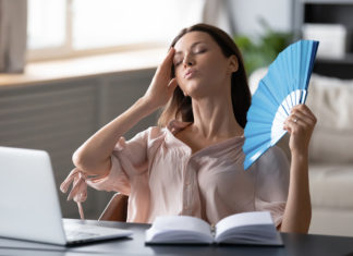 Local Woman Starting to Miss Sweet Summertime Caress of Office Hypothermia