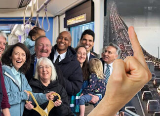 Officials Gather to Celebrate First Crosslake Light Rail Commuter to Flip Off Rush Hour Traffic