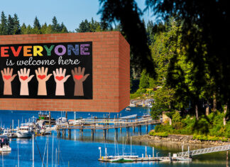 Bainbridge Island Adds ‘Everyone Is Welcome Here’ Sign to 90-Foot Wall Keeping Poors Out