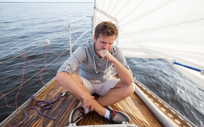 man sea sick sail boat 1600 copy